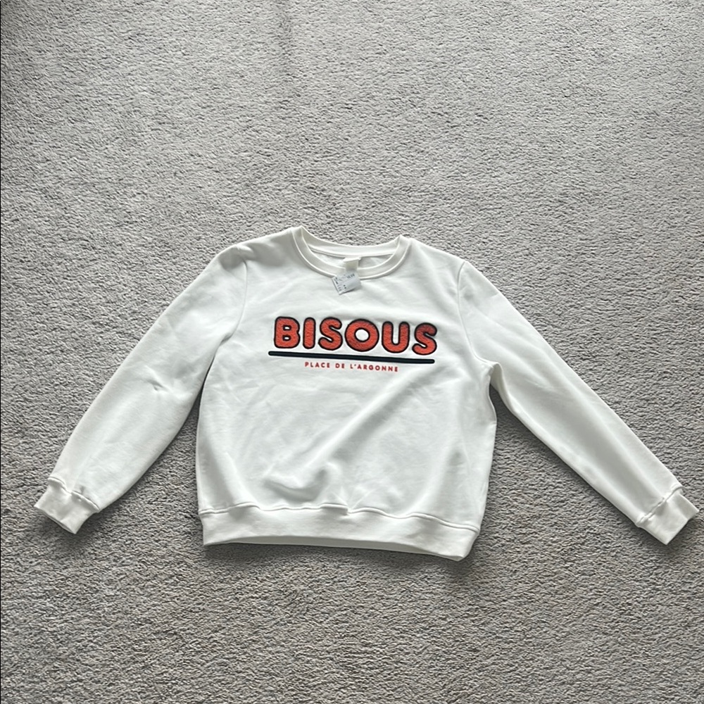 Brand New H&M Pearl White Crewneck Sweatshirt in a size Medium.